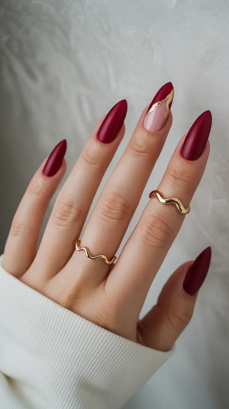 Trendy Red Nails Winter 2025–2026 Velvet Red Almond with Golden Minimalism