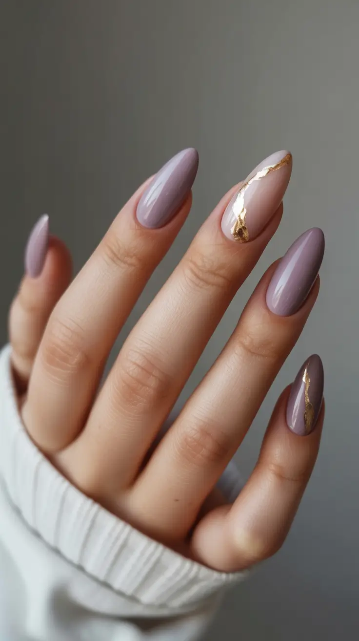 21 Elegant Almond Nails 2026 - Lavender-Taupe Almonds With Gold Accent Detailing