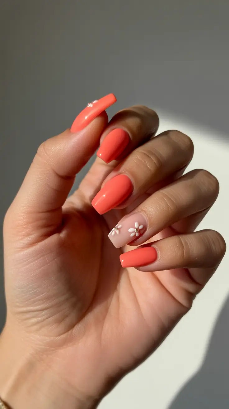 21-new-coffin-nails-2026-Sunlit-Coral-Coffins-With-Tiny-Daisy-Accents